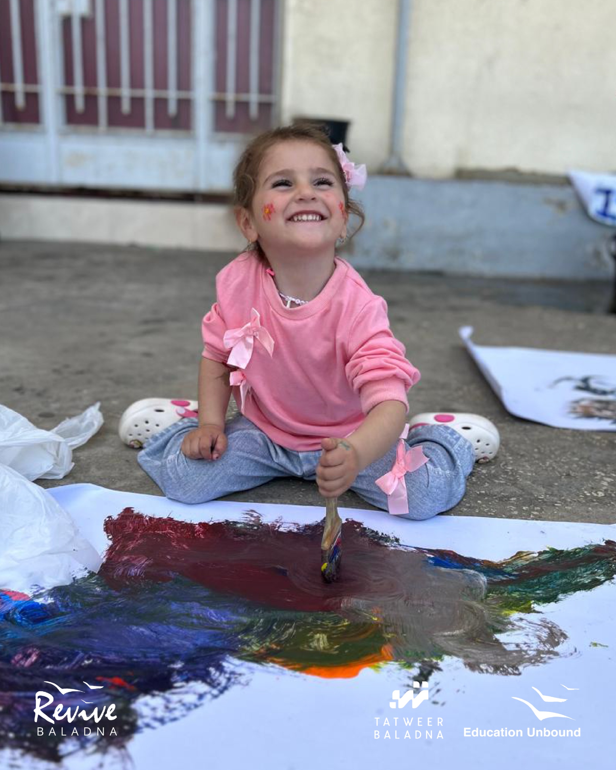 18_HERO_girl_beaming_joy_painting